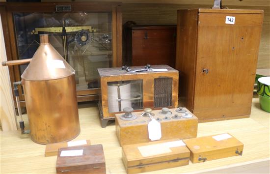 A copper cased barograph, a collection of weights, a balance scale, a Viscometer, a microscope. etc